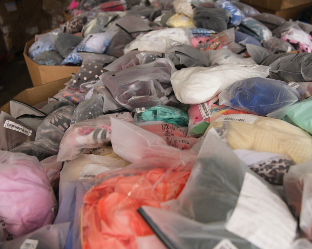 retail-take-back-img clothing from retail take back schemes at RGI warehouse for processing